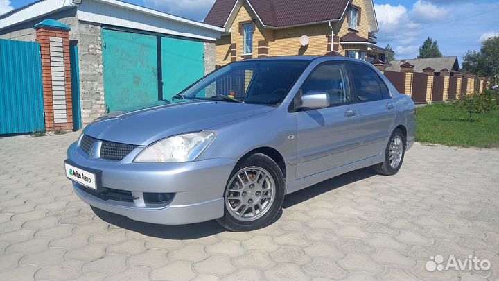 Mitsubishi Lancer 1.6 МТ, 2006, 125 000 км