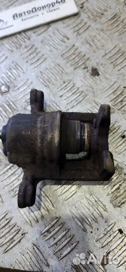 Суппорт задний левый Nissan Juke F15