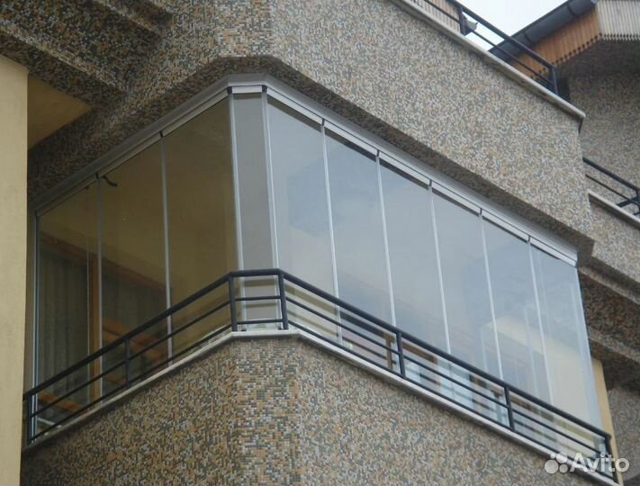 Остекление балкона с обшивкой
