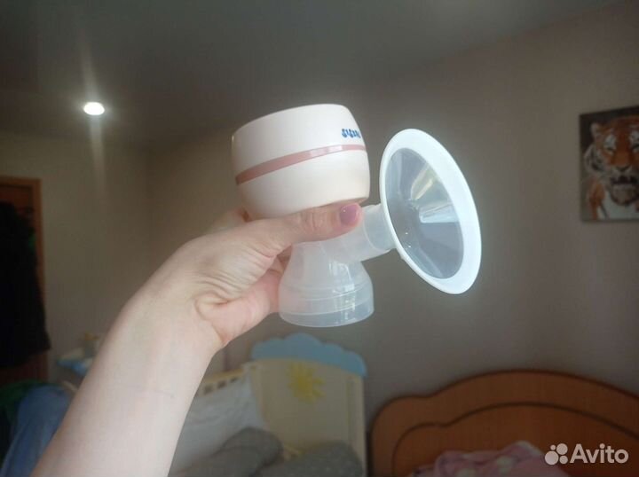 Молокоотсос Сисбро электрический