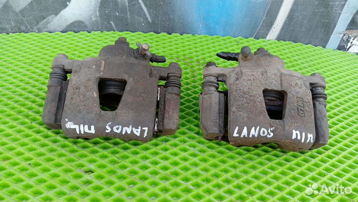 Суппорт тормозной передний левый lanos