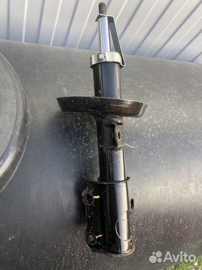 Амортизатор передний левый Opel Astra J