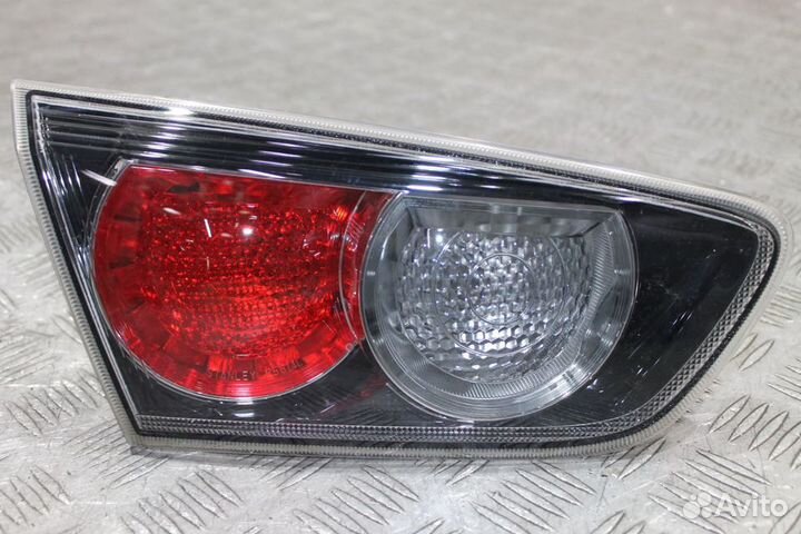 Фонарь крышки багажника левый Mitsubishi Lancer 10