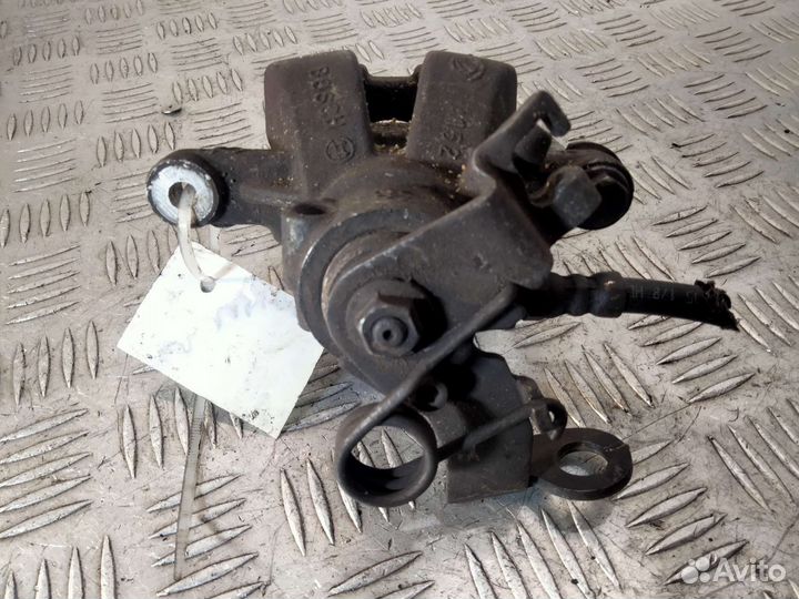 Суппорт задний левый Fiat Bravo 07-14