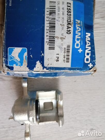 Суппорт тормозной задний правый Mando EX583113KA10