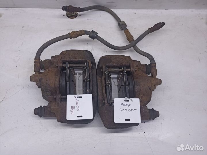 Суппорт тормозной передний ford escort