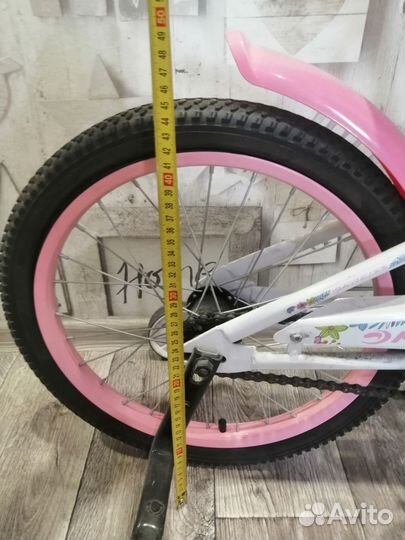 Велосипед и детский домик