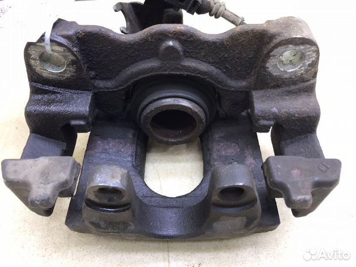 Суппорт задний левый Фольцваген Таурег 1