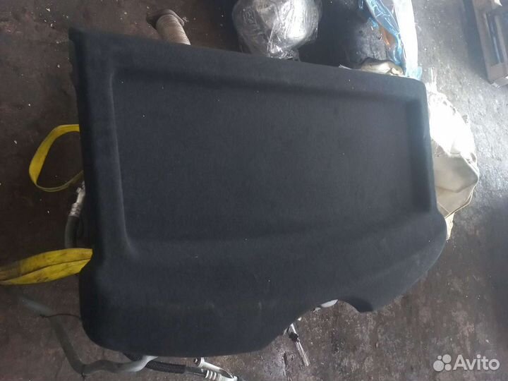 Задняя полка Шкода Рапид