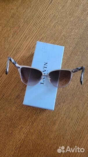Солнцезащитные очки женские брендовые