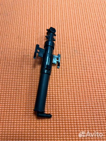 Форсунка омывателей фар передняя левая Land Rover