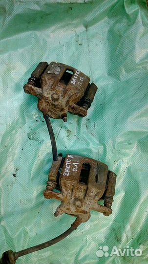 Суппорт тормозной передний Рено Дастер