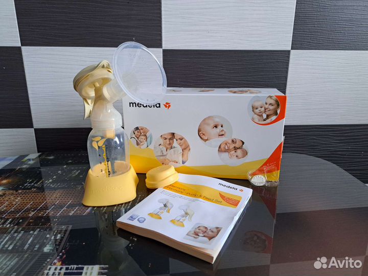 Молокоотсос medela ручной