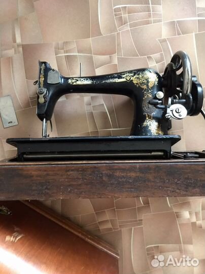 Швейная машина Singer