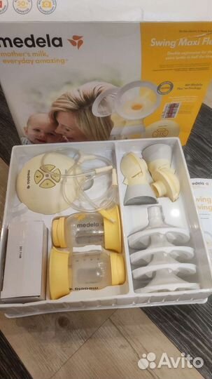 Молокоотсос medela swing flex электрический