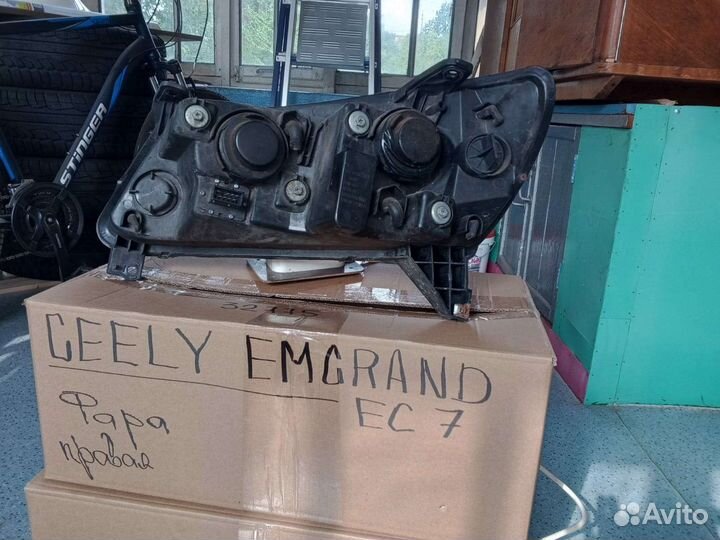 Фара черная Geely Emgrand (09-16г) EC7