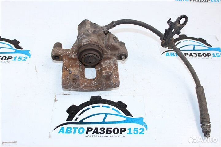 Суппорт тормозной задний левый Mazda 3 BK LF