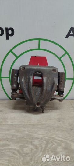 Суппорт тормозной передний правый Toyota Avensis