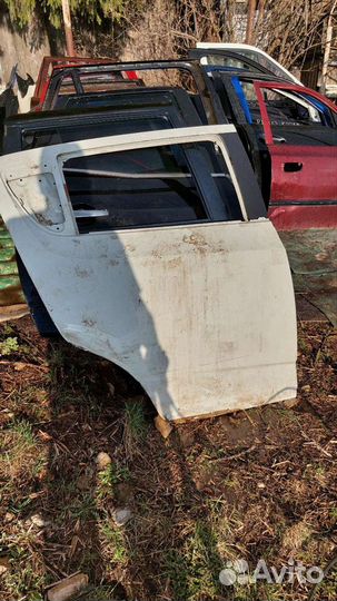 Дверь aveo т300