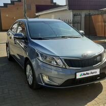 Kia Rio 1.6 AT, 2011, 209 450 км, с пробегом, цена 915 000 руб.