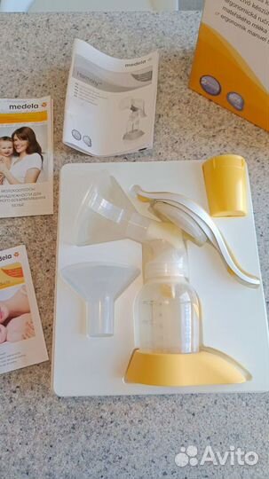 Молокоотсос medela ручной + бутылочки avent