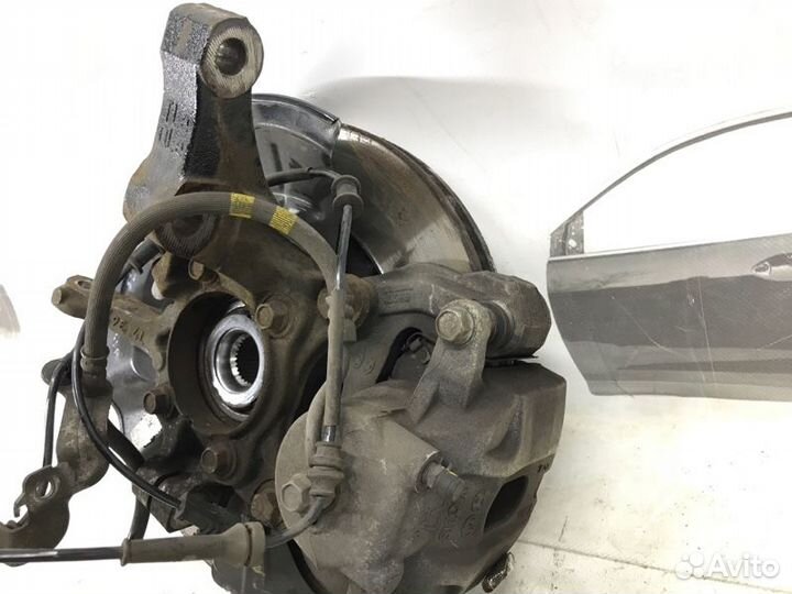 Кулак в сборе передний левый Kia Sportage 4 1.6T