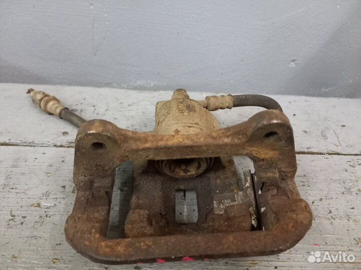 Суппорт задний левый Chevrolet Lacetti хэтчбек