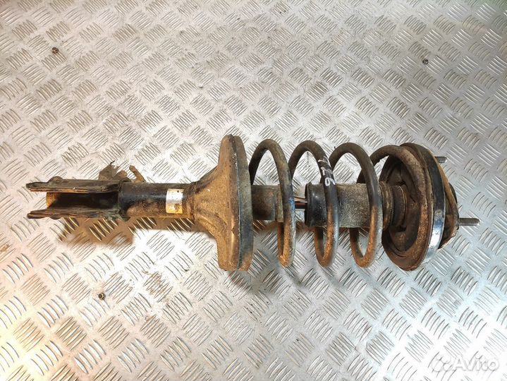 Амортизатор передний левый Mitsubishi Lancer 9