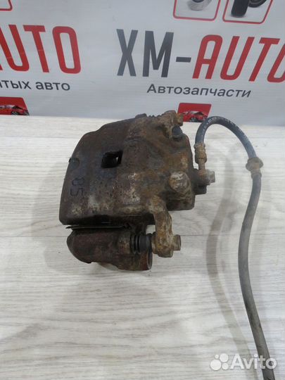 Суппорт передний правый Nissan Teana J32