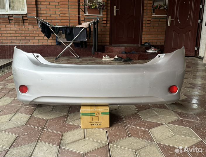 Бампер задний на toyota corolla 150