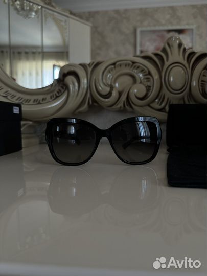 Солнечные очки женские