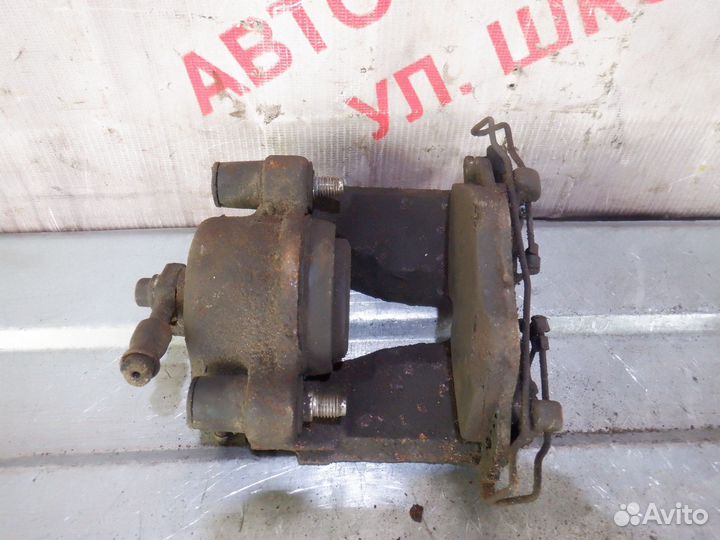 Суппорт передний левый Опель Астра Г