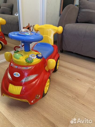 Машинка каталка толокар музыкальная