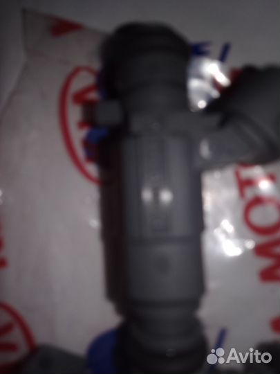 Форсунка инжектора OK2N313250 kia hyundai