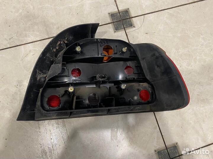 Фонарь задний левый BMW E39