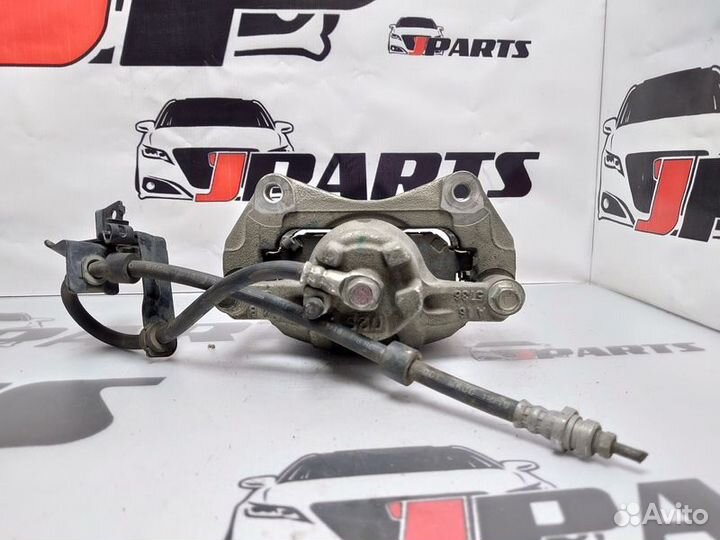 Суппорт тормозной передний Mitsubishi Lancer