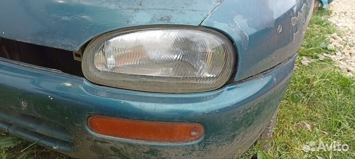 Фара на mazda 121