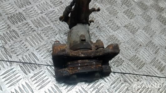 Суппорт тормозной задний правый nissan almera tino