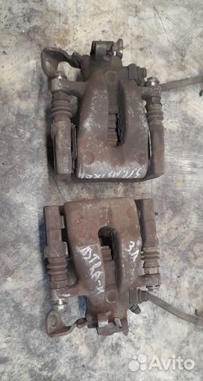 Суппорт тормозной задний Opel Astra H