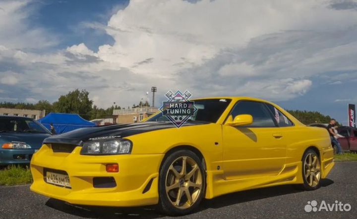 Передний бампер C-West Nissan Skyline R34