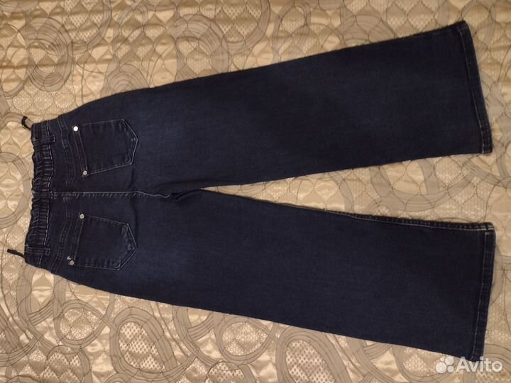 Джинсы широкие