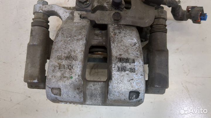 Суппорт правый задний Tesla Model 3, 2019