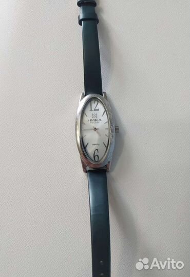 Серебряные часы Ника