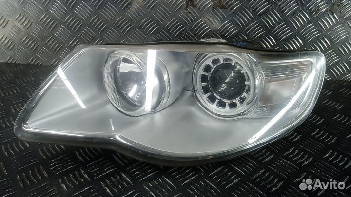 Фара левая Volkswagen Touareg