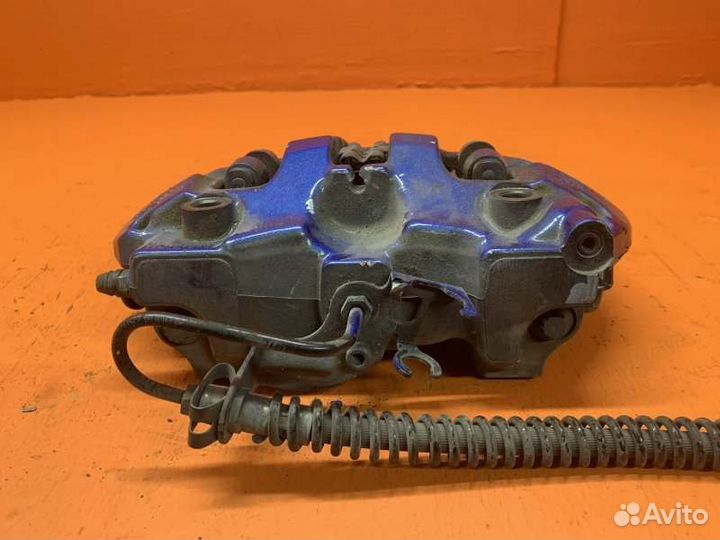 Суппорт тормозной задний левый Porsche Cayenne 958