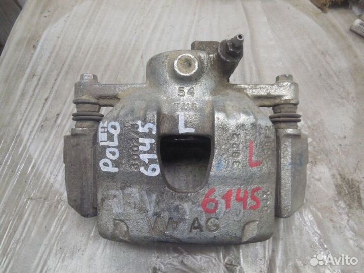 Суппорт тормозной передний Volkswagen Polo 5