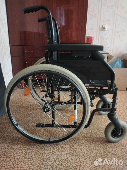 Инвалидная коляска