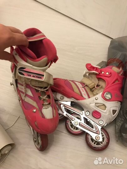 Роликовые коньки