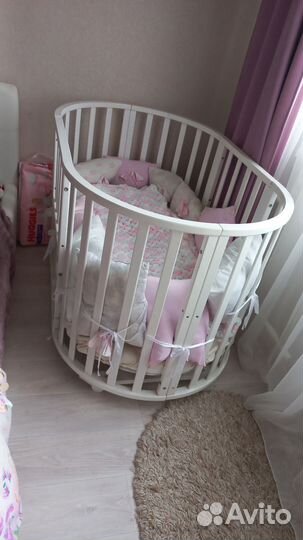 Детская кроватка с маятником круглая