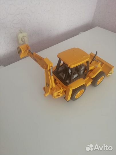 Экскаватор погрузчик Brиder